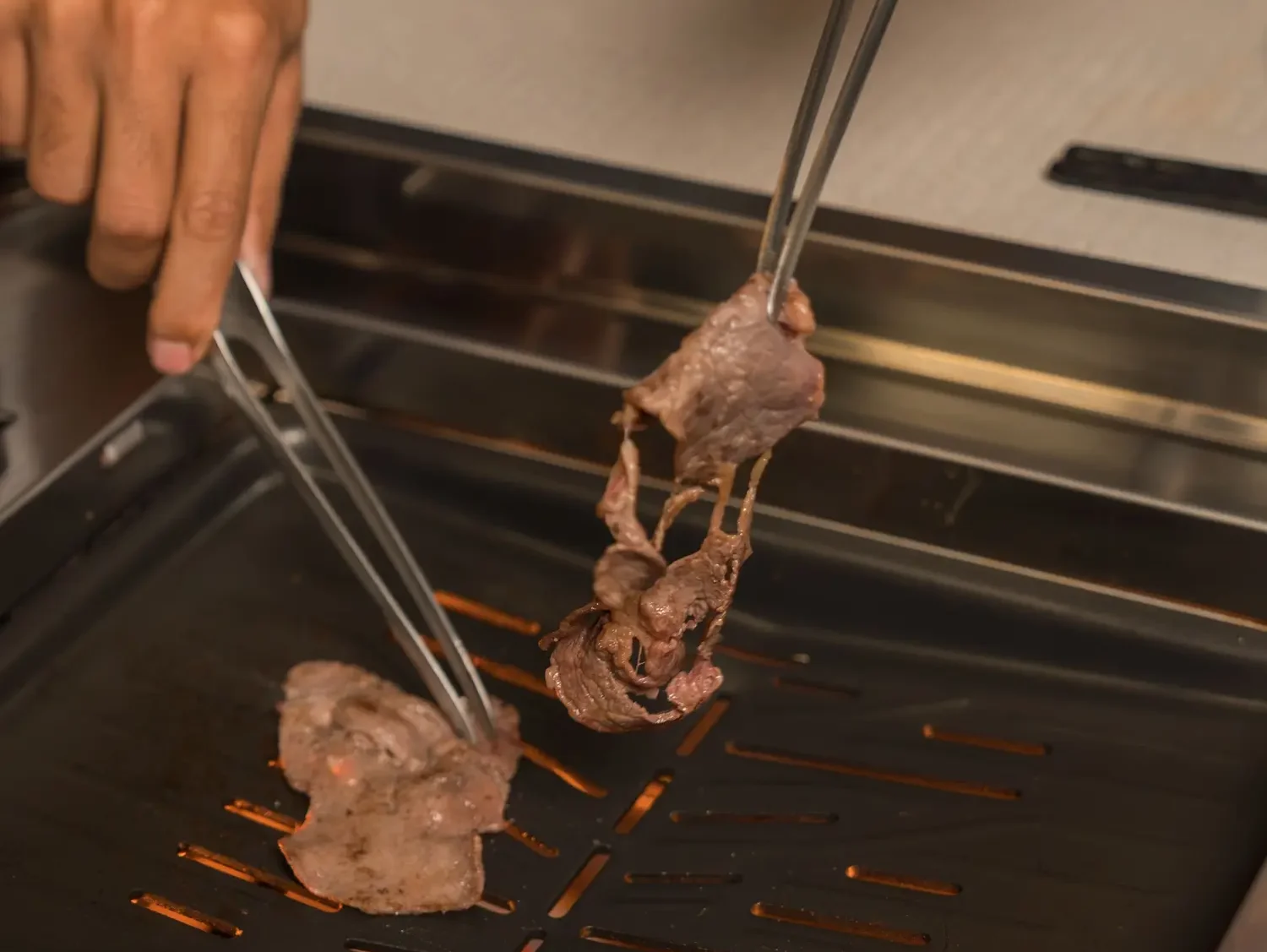 Japanese restaurant Ubud dining experience with beef grilled on a table